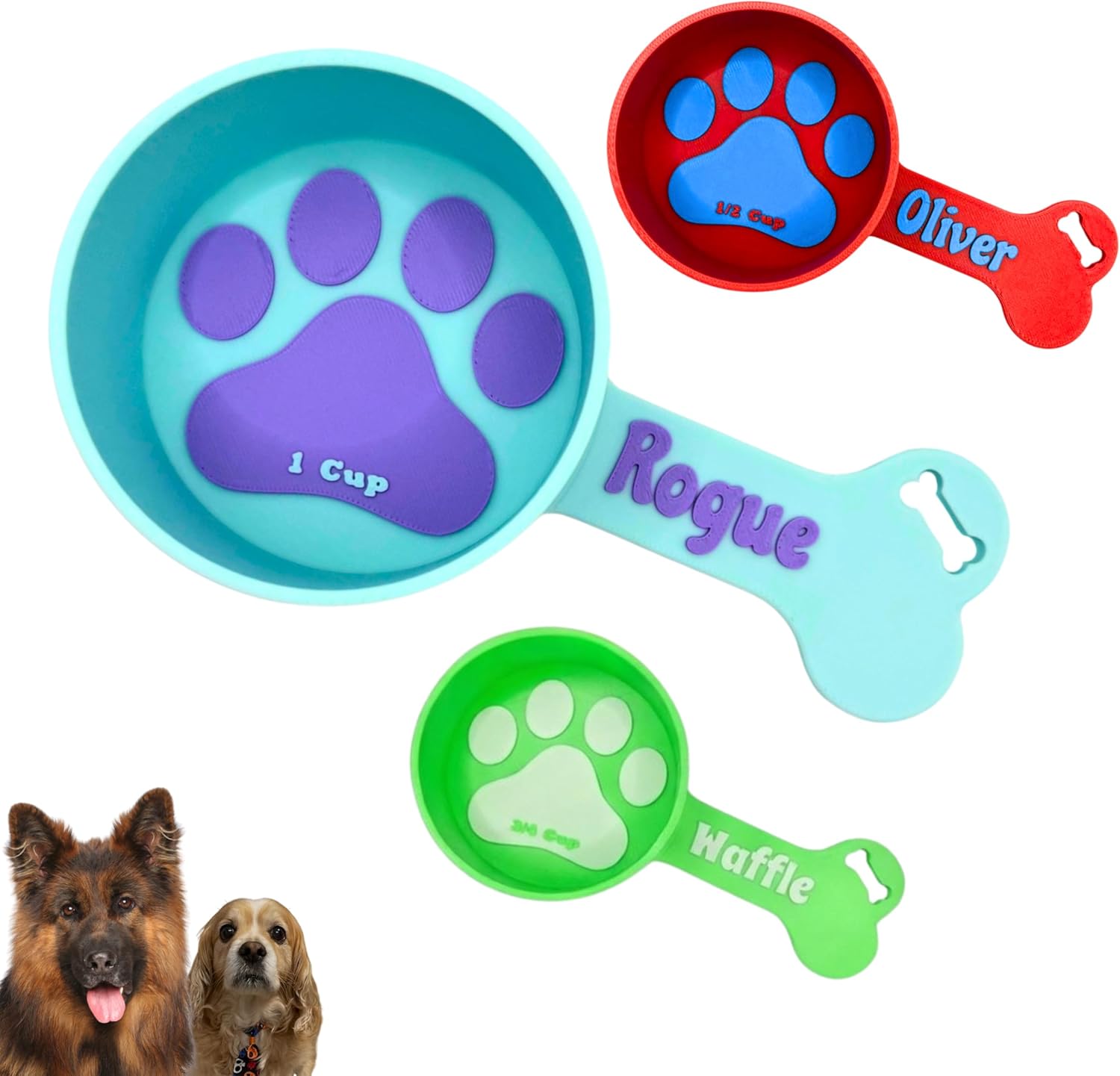 Set of personalized pet food measuring cups with paw prints and names on a white background.